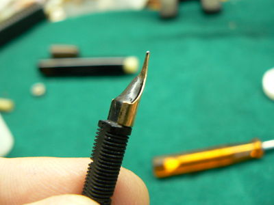 fig.7 - alimentatore e pennino