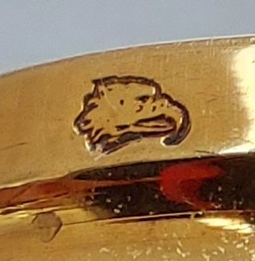 35. W552. Eagle gold 750 hallmark on cap.jpg